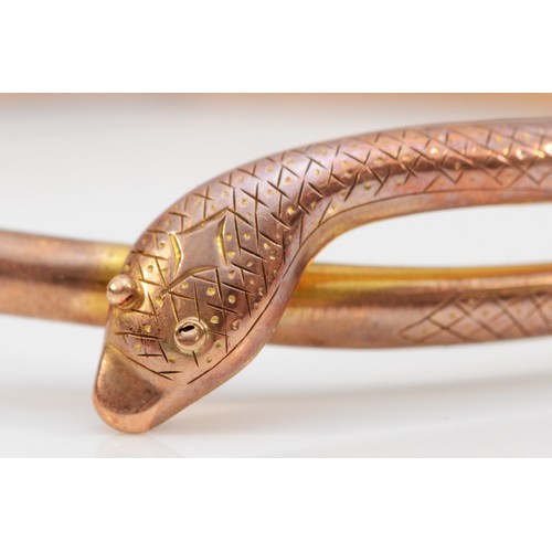 174 - A Victorian 9ct rose gold entwined snake slave bangle, stamped 9ct, PPLd, 9ct, with engraved head an... 