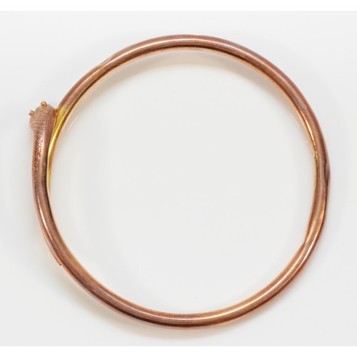 174 - A Victorian 9ct rose gold entwined snake slave bangle, stamped 9ct, PPLd, 9ct, with engraved head an... 