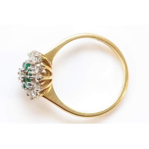 181 - An 18ct gold brilliant cut diamond and emerald floral cluster ring, three tiered ring, middle tier c... 