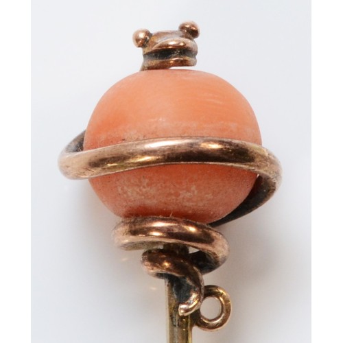 194 - A Victorian unmarked 15ct gold snake stick pin with a coral sphere, 70mm total length, 3.6g