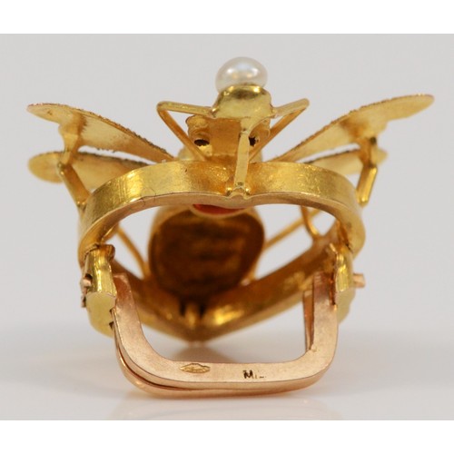 198 - An 18ct gold diamond, garnet topped doublet and seed pearl clip in the shape of a bee, French eagle ... 