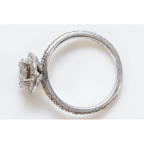 199 - A 950 platinum diamond cluster ring, central diamond is approx 0.10ct, two tier cluster with diamond... 