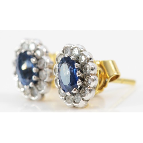 204 - A pair of 18ct gold sapphire and brilliant cut diamond cluster ear studs, London 1996, 10 x 8mm, 3.5... 