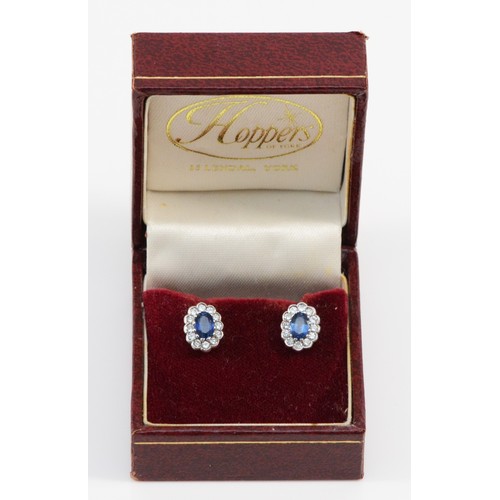 204 - A pair of 18ct gold sapphire and brilliant cut diamond cluster ear studs, London 1996, 10 x 8mm, 3.5... 