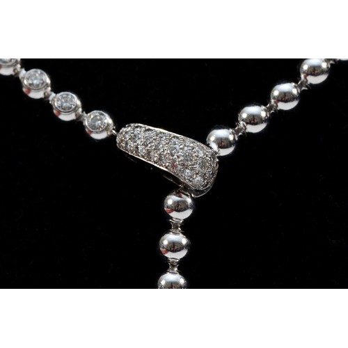 208 - Cartier, a French 18ct white gold and brilliant cut diamond 'Moonlight' ball necklace, signed Cartie... 