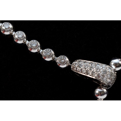 208 - Cartier, a French 18ct white gold and brilliant cut diamond 'Moonlight' ball necklace, signed Cartie... 