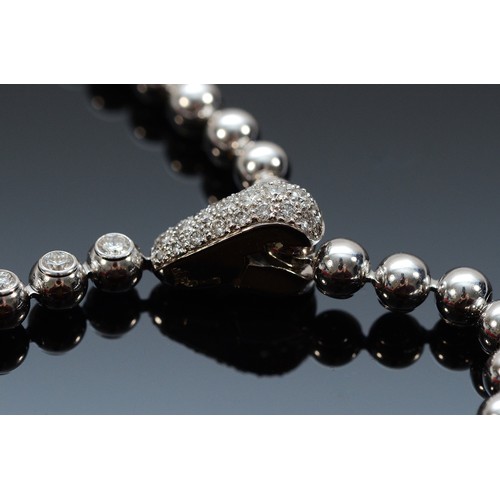 208 - Cartier, a French 18ct white gold and brilliant cut diamond 'Moonlight' ball necklace, signed Cartie... 