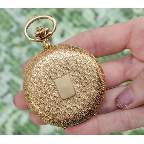 225 - Monard, Geneve, a 14K gold key wind full hunter pocket watch, the white enamel dial with gold ornate... 