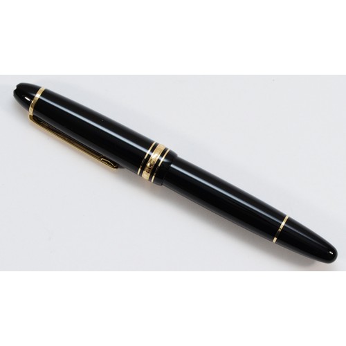 241 - Mont Blanc, Meisterstuck, a black and gilt rollerball pen, case