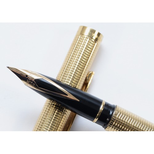 243 - Sheaffer, a gold filled fountain pen, with 14K gold nib, cartridge filler