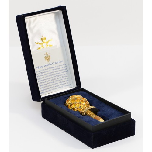 251 - Faberge, Imperial Collection, a enamel and gilt metal adjustable bottle stopper 11.5cm, box