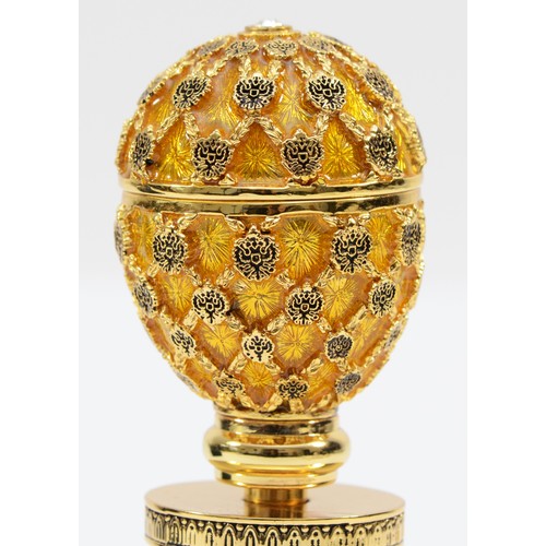 251 - Faberge, Imperial Collection, a enamel and gilt metal adjustable bottle stopper 11.5cm, box