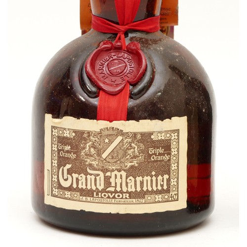 254 - A sealed 75cl bottle of Brandy Sack Gran Reserva, together with a boxed and sealed bottle of Grand M... 