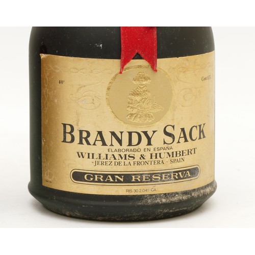 254 - A sealed 75cl bottle of Brandy Sack Gran Reserva, together with a boxed and sealed bottle of Grand M... 