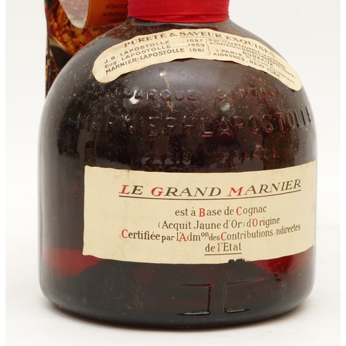 254 - A sealed 75cl bottle of Brandy Sack Gran Reserva, together with a boxed and sealed bottle of Grand M... 