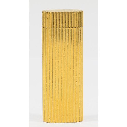 260 - Cartier, Paris, a gold plated oval rollagas ribbed lighter, signed, numbered 27200 S