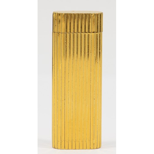 260 - Cartier, Paris, a gold plated oval rollagas ribbed lighter, signed, numbered 27200 S