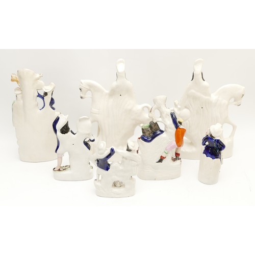 285 - Five Staffordshire Pottery flatback figures, together with two Staffordshire Pottery spill vases, fi... 