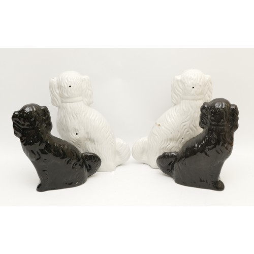 274 - Two pairs of late nineteenth century fireside  Staffordshire Pottery wally dogs, modelled as Spaniel... 