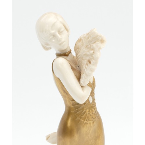 293 - A Capodimonte figurine of a glamorous lady, painted and plated with gold.