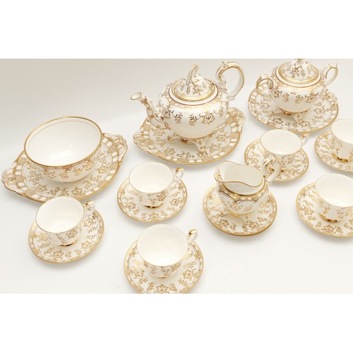 302 - A nineteenth century bone china tea service with gilt floral detail, comprising of fifteen pieces, t... 