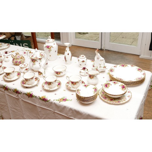 303 - A Royal Albert Old Country Roses dinner service, comprising of, six dinner plates with a diameter of... 