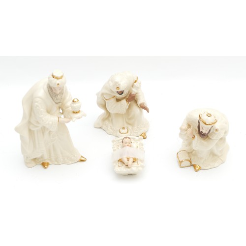 304 - Belleek Living Nativity Collection, to include, The Three Kings and Baby Jesus, in his manger. (4 it... 