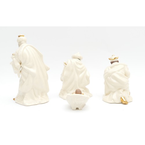 304 - Belleek Living Nativity Collection, to include, The Three Kings and Baby Jesus, in his manger. (4 it... 