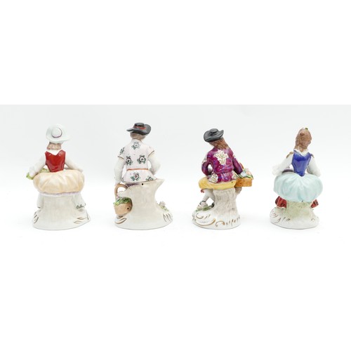 308 - Four late nineteenth century Sitzendorf porcelain models, depicting flower merchants, including two ... 