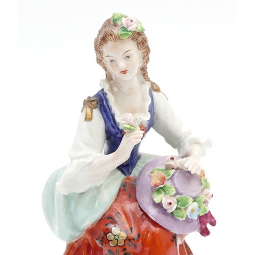 308 - Four late nineteenth century Sitzendorf porcelain models, depicting flower merchants, including two ... 