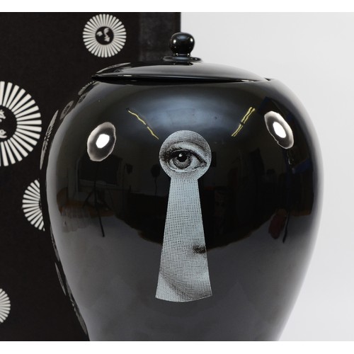 305 - A Fornasetti lidded jar, in the pattern 'Chiave Serratura', depicting Lina Cavalieri peering through... 