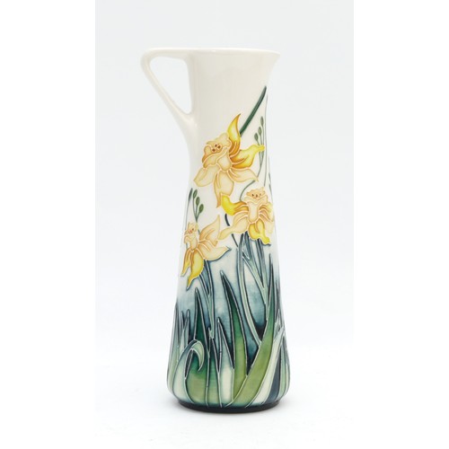 331 - A Moorcroft ewer jug, depicting daffodils, limited edition, 119/150, designed by Nicola Slaney, date... 