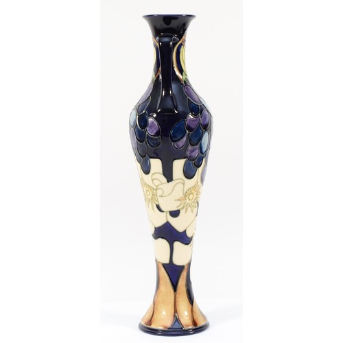 332 - A Moorcroft ewer, depicting florals, grapes and a pomegranate, designed by Anji Davenport, H-32cm.