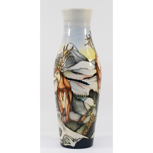 338 - A Moorcroft vase, in the pattern, 'Highland Stags', designed by Kerry Goodwin, dated 2012, H-42cm.