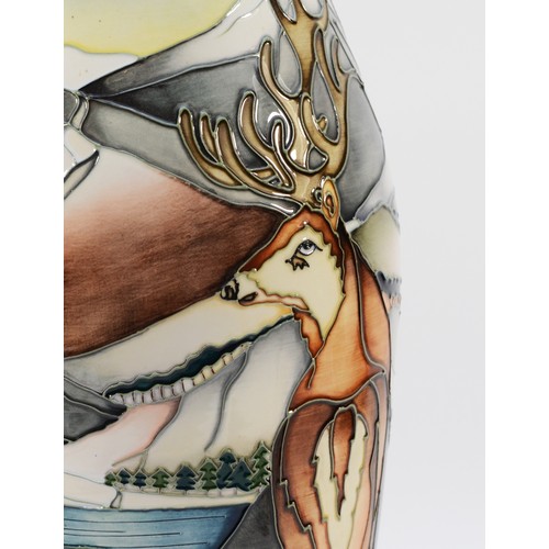 338 - A Moorcroft vase, in the pattern, 'Highland Stags', designed by Kerry Goodwin, dated 2012, H-42cm.