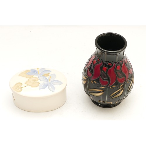 345 - A Moorcroft vase, in the pattern, 'Night Rose', dated 2009, H-10cm, boxed, together with a cream Moo... 