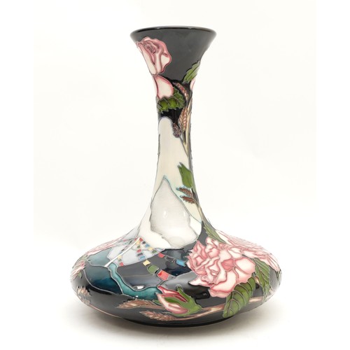 356 - A Moorcroft bottle vase, in the pattern, 'Coronation Day', designed by Vicky Lovatt, no. 56, dated 2... 