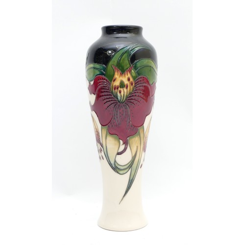 368 - A Moorcroft slim vase, in the pattern, 'Anna Lily', dated 1998, H-26cm.