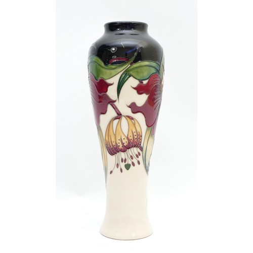 368 - A Moorcroft slim vase, in the pattern, 'Anna Lily', dated 1998, H-26cm.