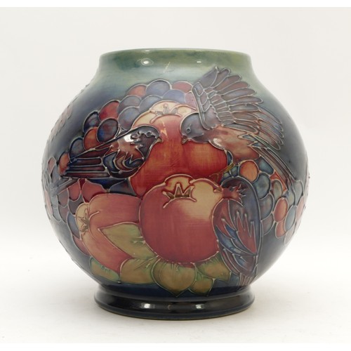 379 - A Moorcroft vase, in the pattern, 'Finches and Fruit', dated 1991 with a bell stamp and marked WM, H... 