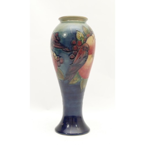 380 - A Moorcroft vase, in the pattern, 'Finches and Fruit', no. 55, dated 1990 with an arrow stamp and ma... 