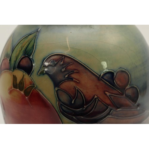 380 - A Moorcroft vase, in the pattern, 'Finches and Fruit', no. 55, dated 1990 with an arrow stamp and ma... 