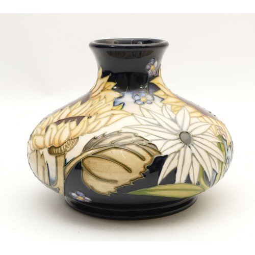 383 - A Moorcroft Trial vase, depicting sunflowers, designed by Anji Davenport and signed by Vicky Lovatt,... 