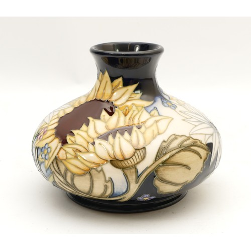 383 - A Moorcroft Trial vase, depicting sunflowers, designed by Anji Davenport and signed by Vicky Lovatt,... 