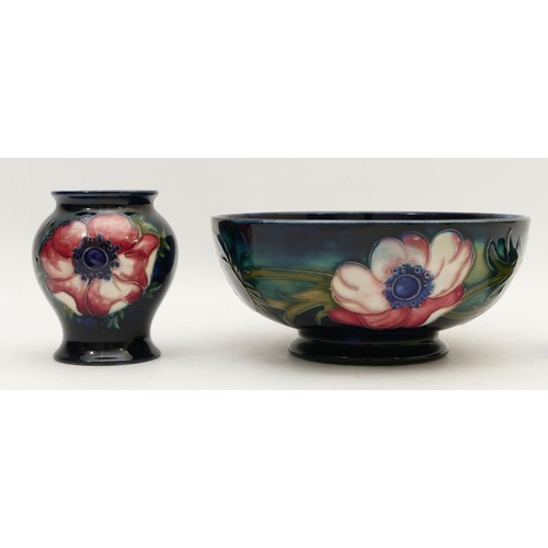 389 - Two Moorcroft dishes and a vase, in the pattern, 'Anemone', manufactured between 1947-53, the larger... 