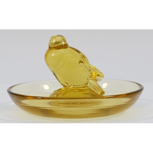 410 - René Lalique (French, 1860-1945): A citrine yellow glass cendrier or trinket dish, 9cm diameter, eng... 