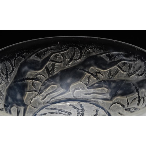 412 - René Lalique (French, 1860-1945): A Chiens Levrier  glass bowl, the underside moulded with dogs and ... 