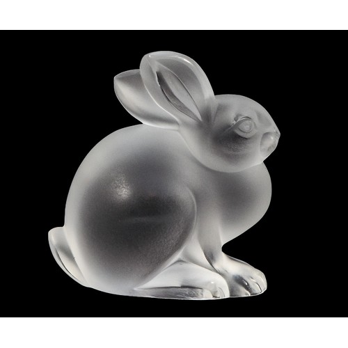 415 - A Lalique figurine, in the shape of a seated rabbit with a frosted finish, complete with engraved si... 