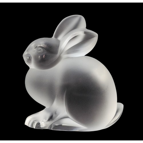 415 - A Lalique figurine, in the shape of a seated rabbit with a frosted finish, complete with engraved si... 