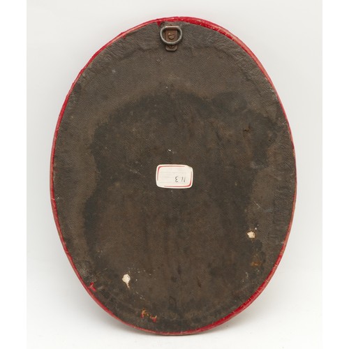 430 - A gilt bronze plaque, depicting the Pope, possibly Pope Pius XII, on a red velvet oval mount, 49cm x... 